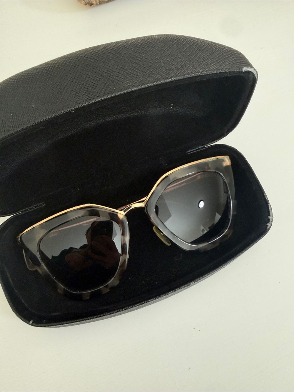 Prada Black Tortoiseshell Sunglasses with Gold Trim